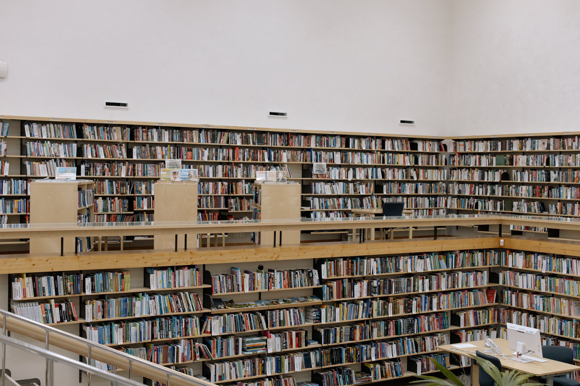 a large library with lots of books on shelves